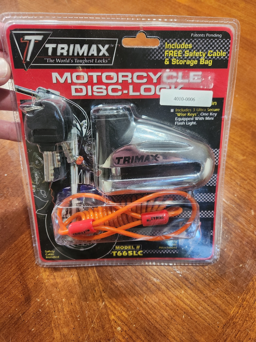 New Silver Motorcycle Disc Lock with Orange Safety Cable